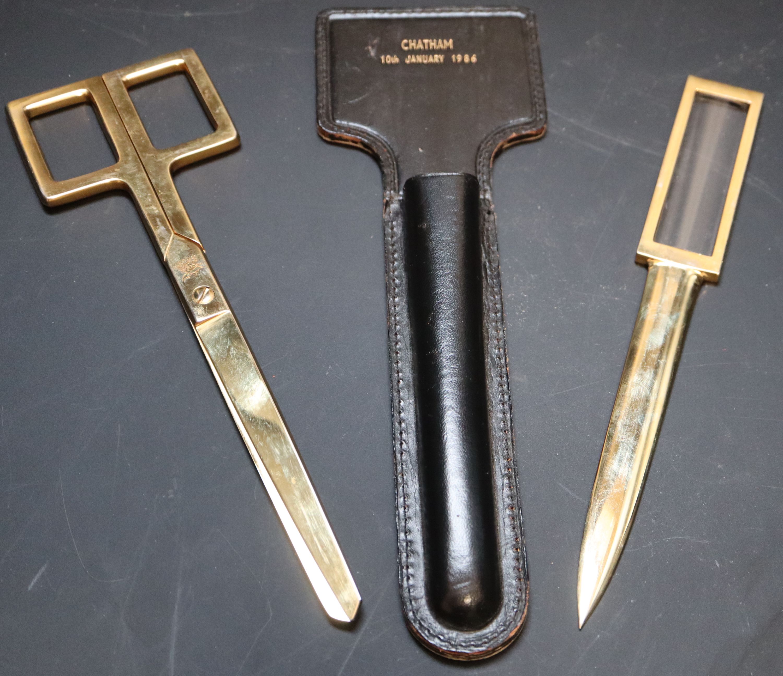 An Asprey gilt metal desk set, overall length 26cm